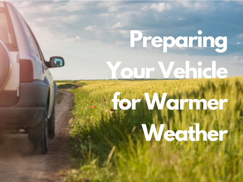 Vehicle driving on a dirt road on a sunny day
